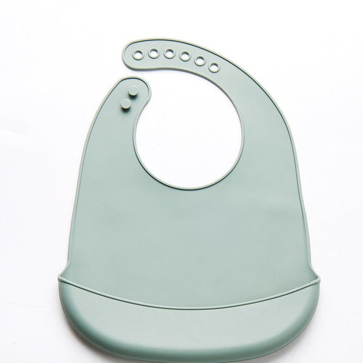 Bavoir vert en silicone avec récupérateur