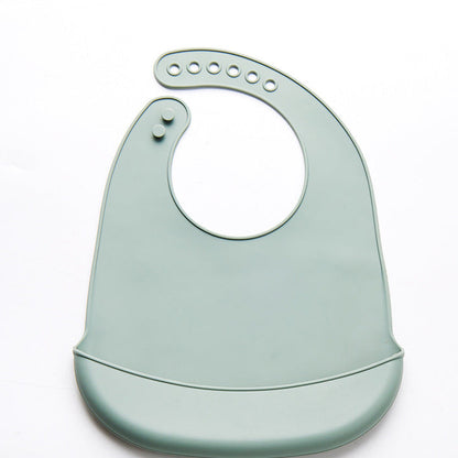 Bavoir vert en silicone avec récupérateur